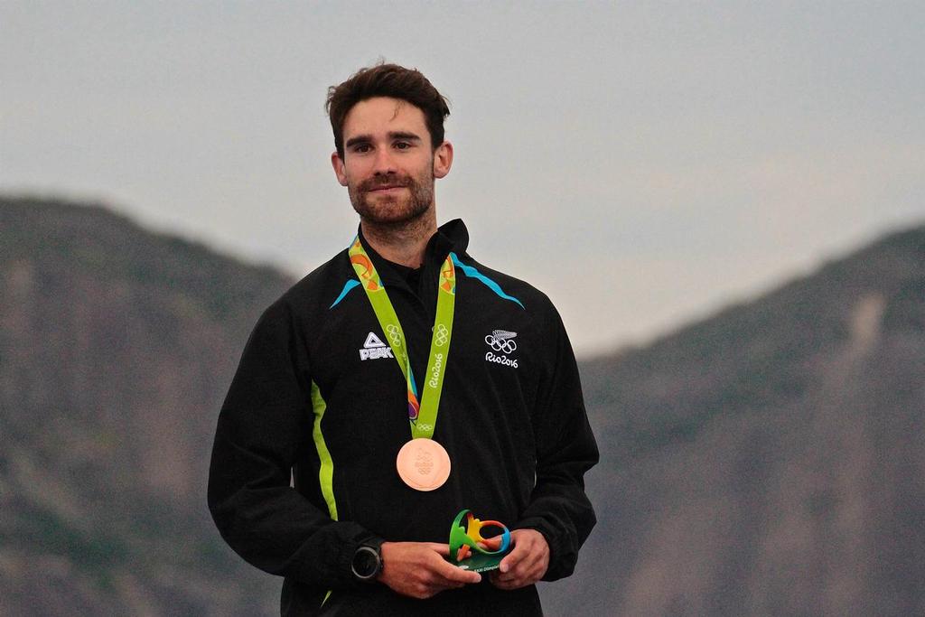 Sam Meech (NZL) on the podium after being presented with his Bronze medal in the Mens Laser class - 2016 Olympics &copy; Richard Gladwell www.photosport.co.nz